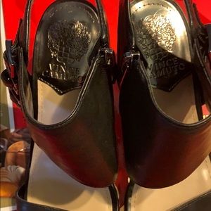 One pair of black leather sandles